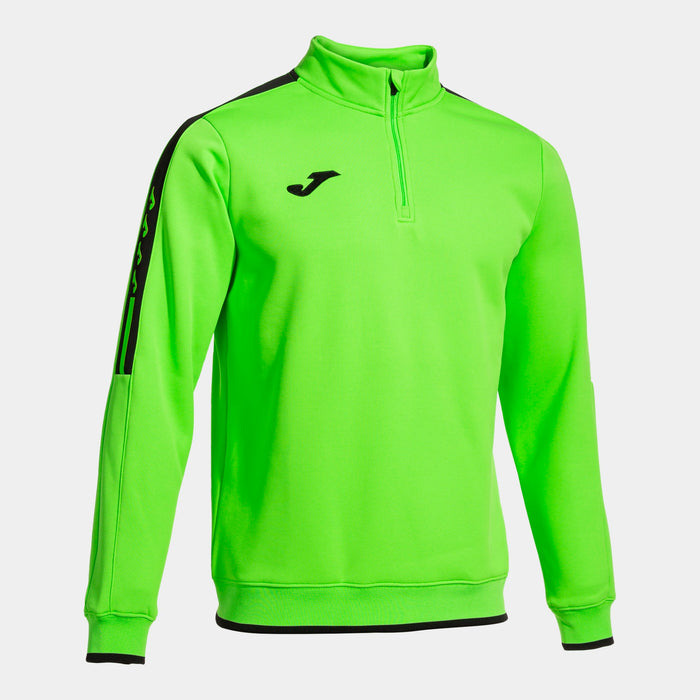A green men's half-zip sweatshirt with a high collar, black accents and the white Joma logo on the left sleeve.